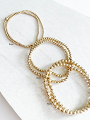 gold bead bracelet. beaded bracelets. enewton bracelets. gold ball bracelets. beaded bracelets for women. gold filled bracelet. bracelet stacks. beaded stretch bracelets.